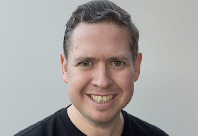 Head shot of Joel Roland