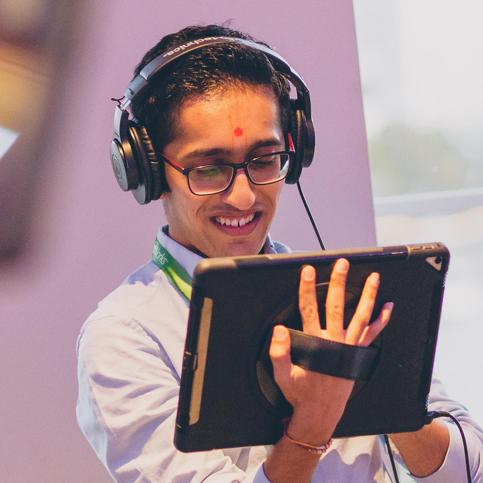 Image of a Thoughtworker playing an AR game at an awayday