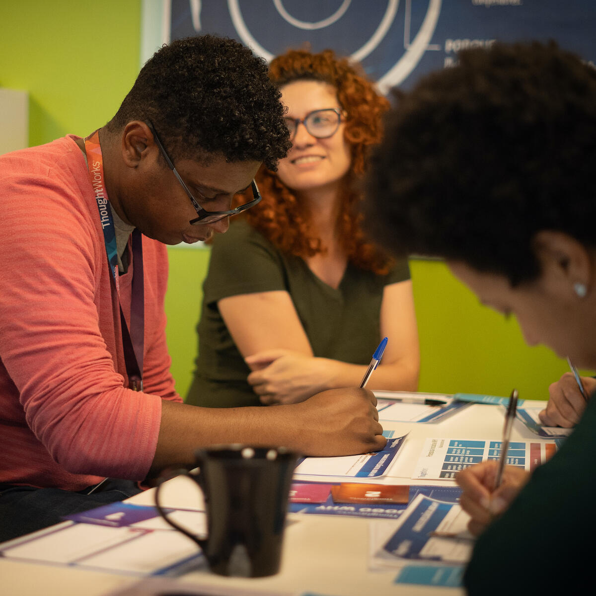 Image of two Thoughtworkers in Brazil in a workshop