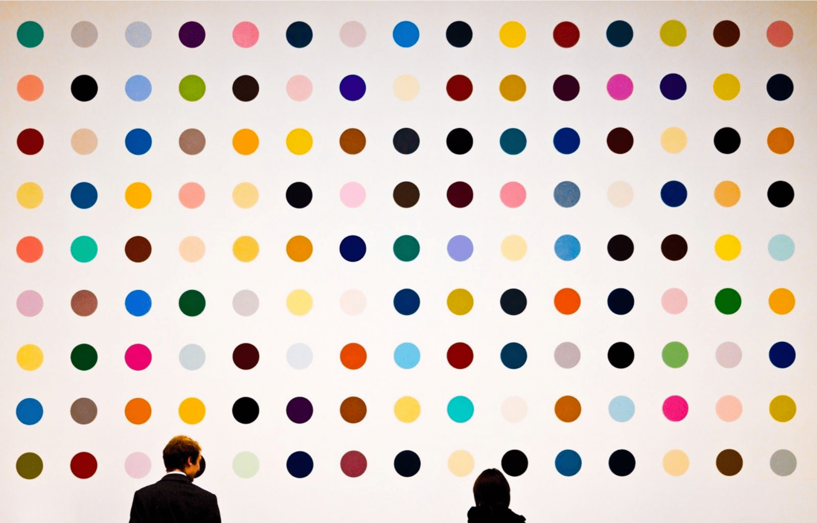 Multi-coloured dots on a wall