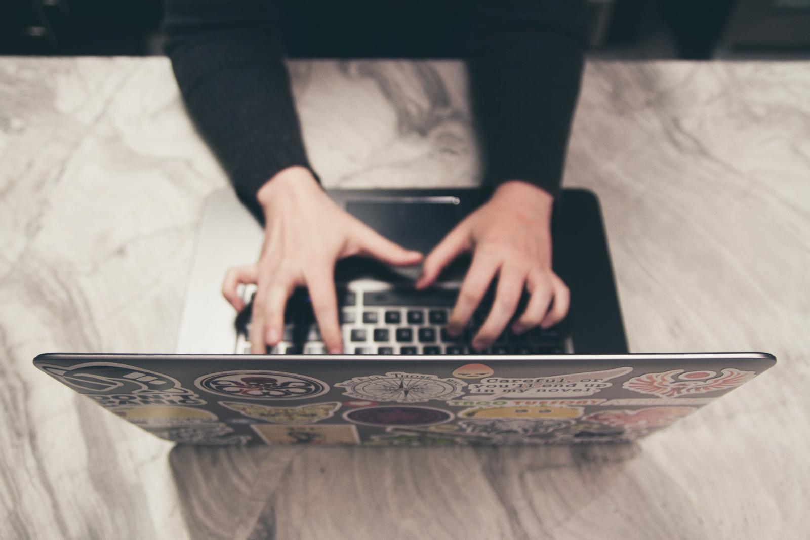 Person working on laptop computer