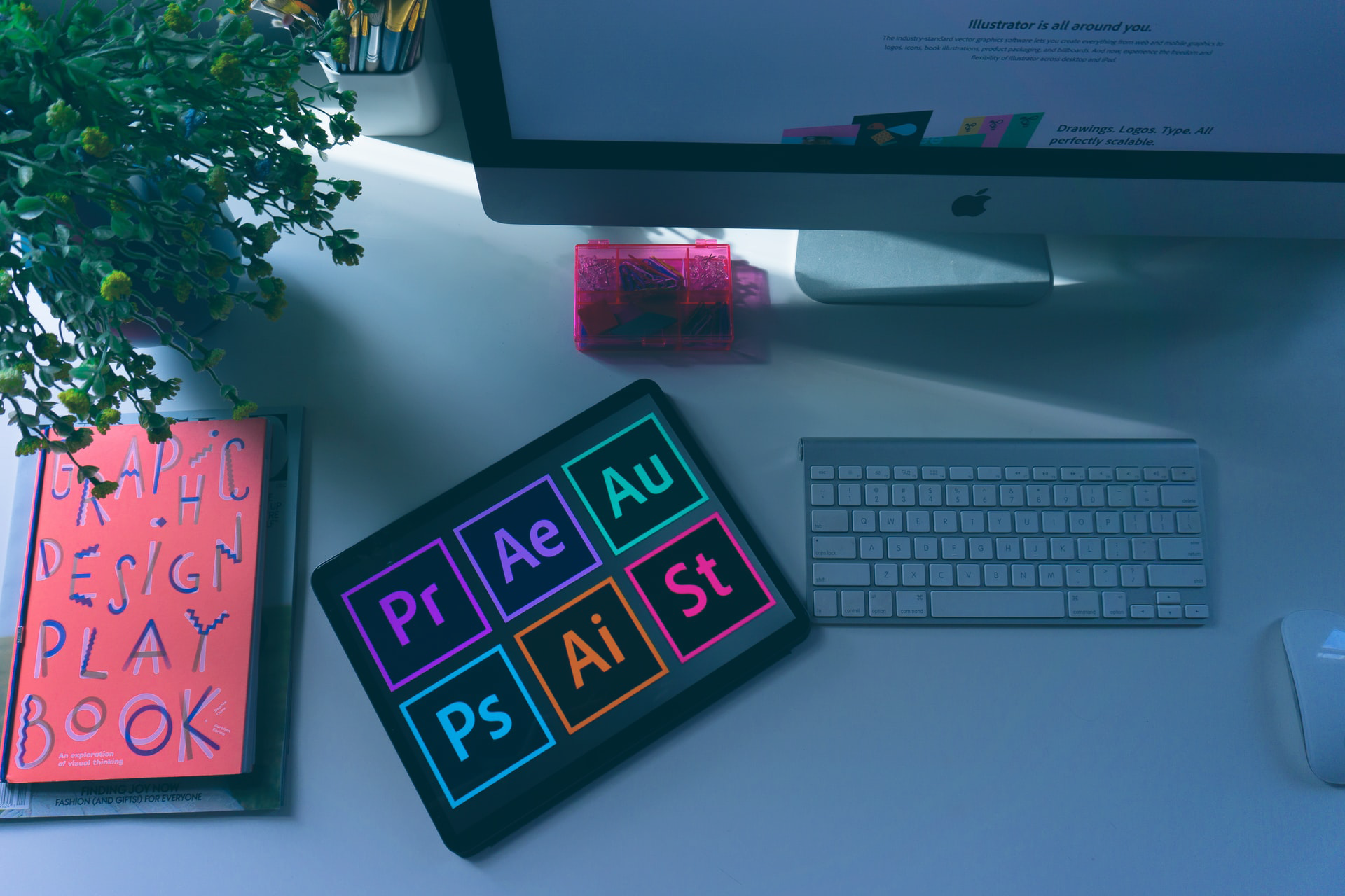 photo with keyboard, computer and adobe suite photo with keyboard, computer and adobe suite