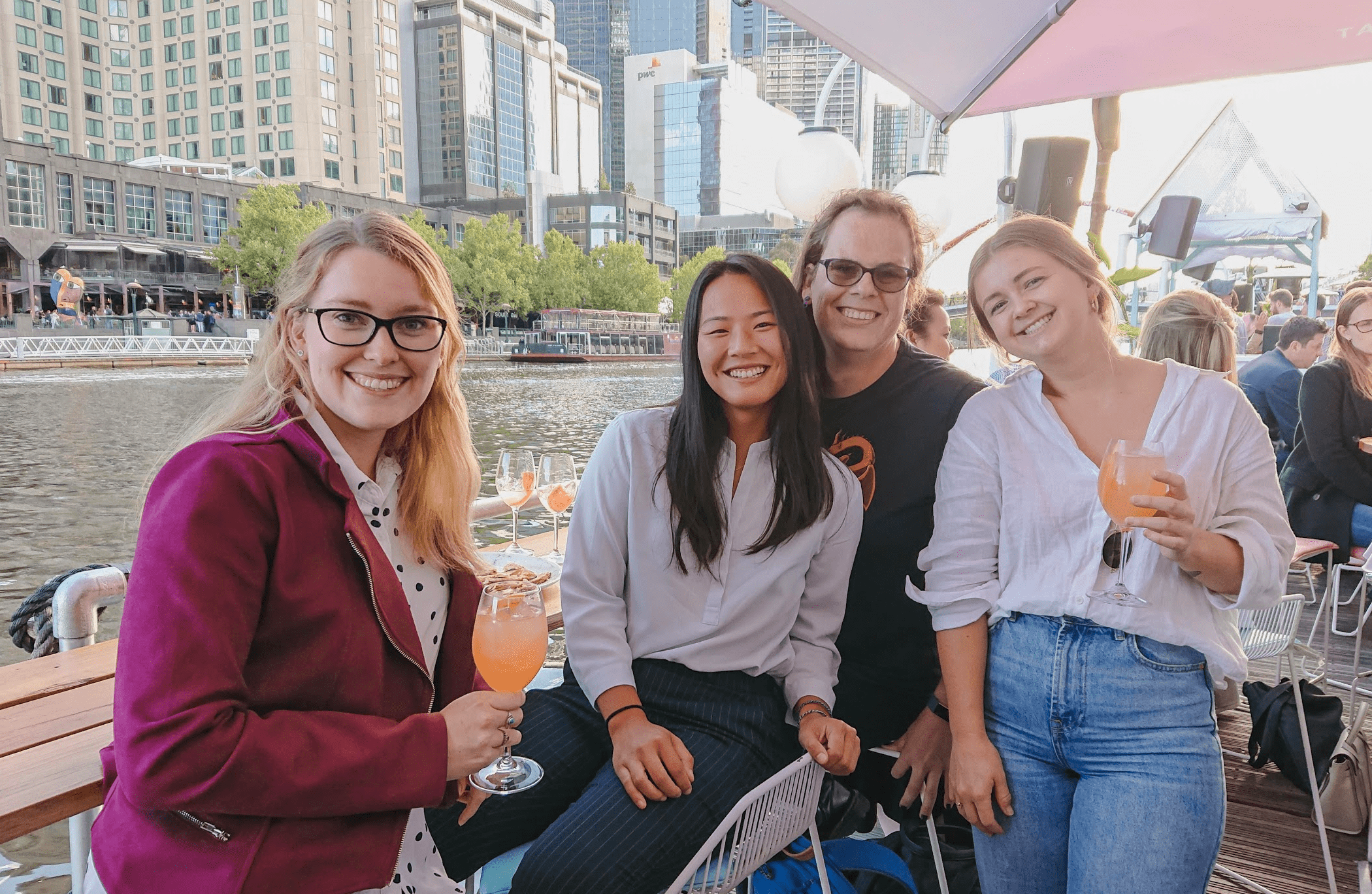 A group of friends by the waterfront at Melbourne's Southbank