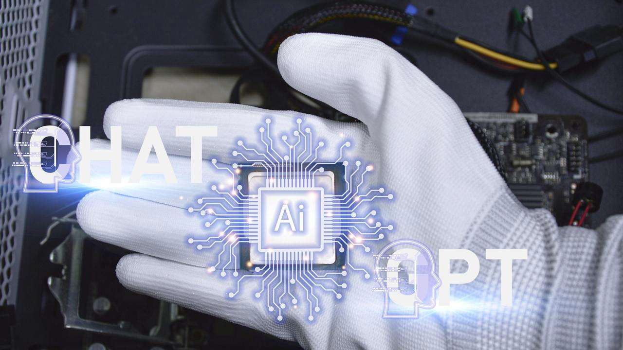 ChatGPT words over a gloved hand holding an AI processing chip removed from a computer