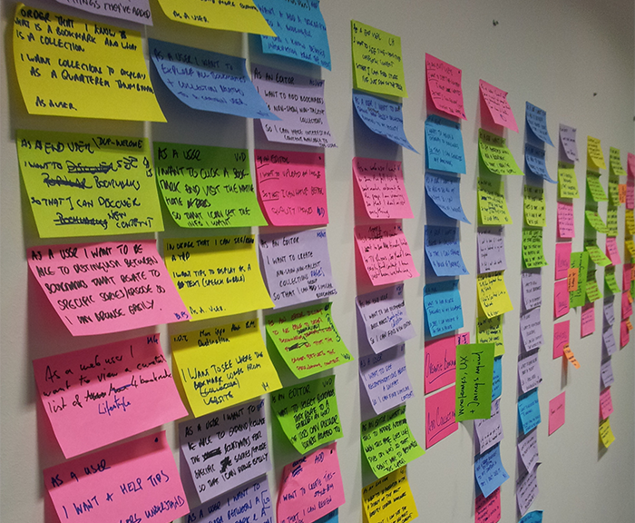 Sprinkle the gold dust - get everyone involved in the story  multi-coloured post it notes lined up on a wall
