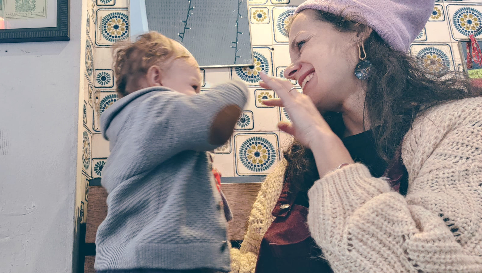 Elizabeth Rice with her son playing Elizabeth Rice with her son playing