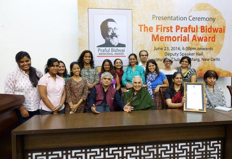 PARI is a diverse group of volunteers with various skills and languages, distributed geographically. Here PARI volunteers receiving an award from historian Romila Thapar.