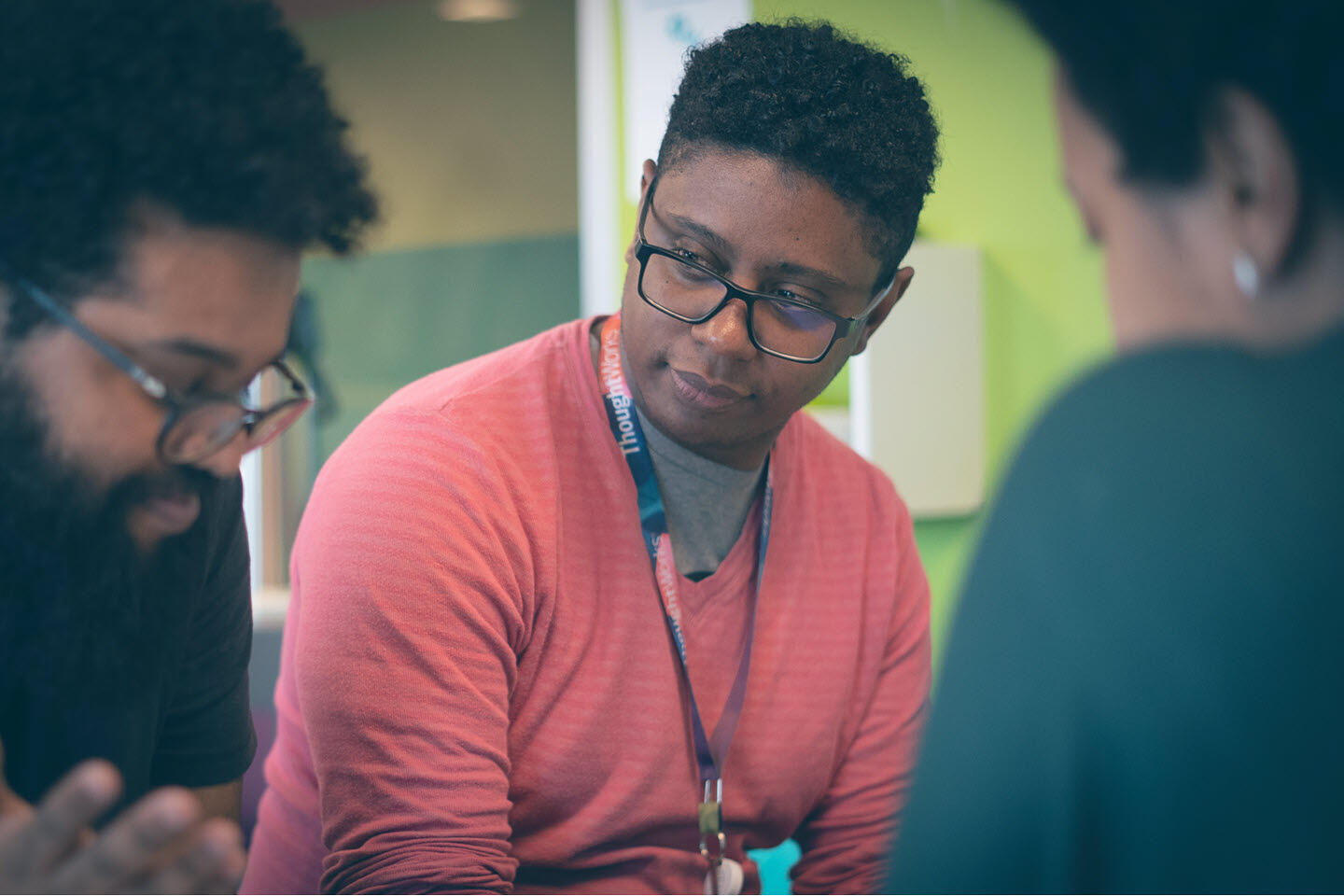 Small group of Thoughtworkers working together at a table