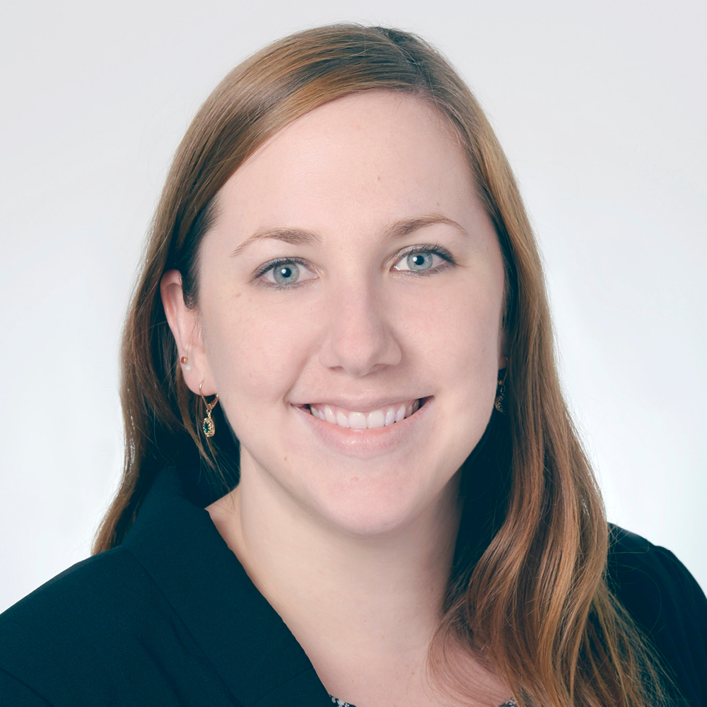 Image of Claire smiling at the camera