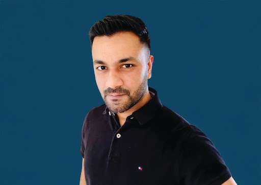 Headshot of Hormese Tharakan