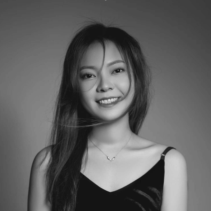 Black and white image of Ziyue Wang smiling